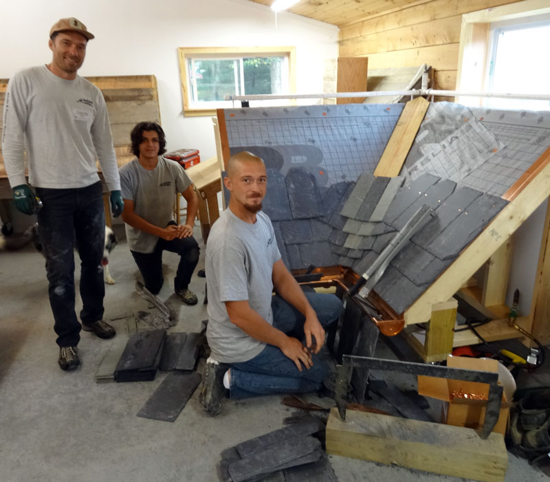 Laced slate valley installation is taught at the Slate Roofing Contractors Association conference. Laced slate valley installation is taught at the Slate Roofing Contractors Association conference.